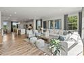 Open concept living and kitchen area with hardwood floors and island at 7112 Brookview Ln, Sherrills Ford, NC 28673