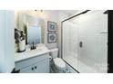 Small bathroom with shower and single vanity at 8024 Plymouth Dr, Sherrills Ford, NC 28673