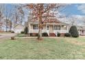 House exterior showcasing a front porch and walkway at 125 Foy Ln, Statesville, NC 28625