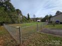 Large fenced backyard with a shed at 2110 Zion Church Rd, Hickory, NC 28602