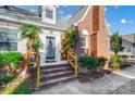 Brick home with inviting front porch and entrance at 3703 Margaret Wallace Rd, Matthews, NC 28105