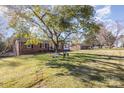Ranch home with large yard, mature trees, and play area at 319 Circleview Dr, Shelby, NC 28150