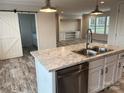White shaker cabinets, marble countertops, and stainless steel appliances at 51 Rosemont Dr, Stony Point, NC 28678