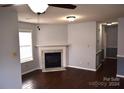 Living room featuring a marble fireplace, hardwood floors, and neutral-toned walls at 1091 Farm Pond Ln, Rock Hill, SC 29732