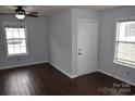 Living room with dark hardwood floors and light walls, offering a bright and airy atmosphere at 1091 Farm Pond Ln, Rock Hill, SC 29732
