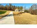 House on a large lot with a long driveway at 3850 Willow Grove Ln # 24, Concord, NC 28025