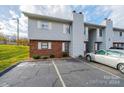 Exterior view of attached home with parking at 123 23Rd Nw St # E, Hickory, NC 28601