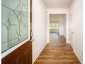 Hardwood floor entryway leading to living room at 7736 Woolsey Dr, Gastonia, NC 28056