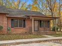 Brick ranch home with a covered porch at 124 Ashleigh Ct, Fort Mill, SC 29715