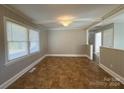 Cozy dining area with tile floors and access to kitchen at 1300 Weststone Dr, Charlotte, NC 28208