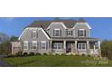 Two-story home with gray siding, stone accents, and a front porch at Lot 42 Watercourse Way # Hawthorne, Belmont, NC 28012