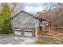 Two-car garage with additional upper level and stairs at 155 Timberbrook Ln, Statesville, NC 28625