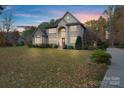 Two-story house with a large front yard and driveway at 7381 Bay Cove Ct, Denver, NC 28037