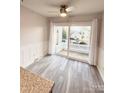 Cozy dining area with sliding door to backyard at 213 Eastwood Dr, Salisbury, NC 28146