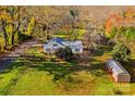 Ranch house on a large lot with detached shed at 230 Feimster St, Statesville, NC 28677
