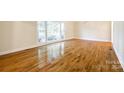 Spacious dining room featuring hardwood floors and large windows at 2129 James Ct, Rock Hill, SC 29732
