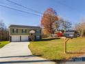 Modern home with a two-car garage and a spacious yard at 3215 24Th Ne St, Hickory, NC 28601