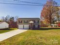 Modern house with a two-car garage and a spacious yard at 3215 24Th Ne St, Hickory, NC 28601