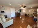 Spacious living area with hardwood floors and lots of natural light at 7855 Nc Highway 90 E None, Stony Point, NC 28678