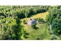 House with a large backyard surrounded by trees, seen from an aerial perspective at 1727 Will Schronce Rd, Lincolnton, NC 28092