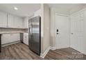 Modern kitchen with stainless steel appliances and white cabinets at 9039 J M Keynes Dr # 19, Charlotte, NC 28262