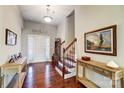 Bright and spacious foyer with hardwood floors and staircase at 4403 Gwen Hartis Ct, Monroe, NC 28110