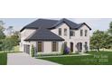 Two story home with white brick, dark gray roof and landscaping at 0 S Potter Rd # 1A, Waxhaw, NC 28173