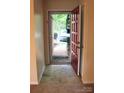 Bright entryway with tiled flooring and a red front door at 4605 Coronado Dr, Charlotte, NC 28212