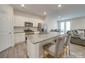 Modern kitchen featuring stainless steel appliances and an island at 5021 Markfield Ln, Monroe, NC 28110