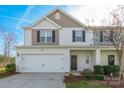 Two-story townhome featuring a neutral color palette and attached garage at 8127 Paw Club Dr, Charlotte, NC 28214