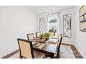 Formal dining room with hardwood floors and a wood table for six at 3892 Maxwell Henry Nw Ln, Conover, NC 28613