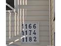 Close-up of building numbers 1166, 1174, 1182 at 1174 Plaza Walk Dr, Charlotte, NC 28215