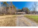 House exterior showcasing a charming front yard and driveway at 1776 Molly Cir, York, SC 29745