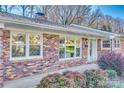 Brick facade with updated windows and landscaping at 3143 Whitson Rd, Gastonia, NC 28054