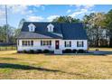 White one-story house with gray roof, and front porch at 473 Griggs Rd, Clover, SC 29710