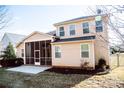 Back of house with screened porch and fenced backyard at 2018 Clarion Dr, Indian Land, SC 29707