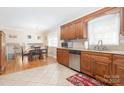 Kitchen with granite countertops and stainless steel dishwasher at 1315 Shady Bluff Dr, Charlotte, NC 28211