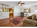 Hardwood floor living room, view to kitchen and sitting area at 910 Tait St, Lincolnton, NC 28092