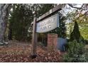 Galloway Towns community entrance sign with brick pillars and wood post at 2113 Bayou Trace Dr, Charlotte, NC 28262