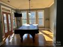 Bright game room with a pool table and plenty of natural light at 1327 Moonshadow Ln, Shelby, NC 28150