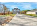 Two-story house with a long concrete driveway at 1209 Burris Blvd, Lincolnton, NC 28092