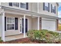 Front entry with columns, shutters, and well-manicured landscaping at 808 Plateau Ct, Rock Hill, SC 29730