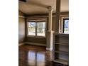 Living room with hardwood floors and built-in shelving at 2617 Plantation Way, Albemarle, NC 28001