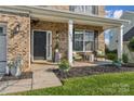 Inviting front porch with seating area, perfect for relaxing at 1980 Caprington Dr, Indian Land, SC 29707