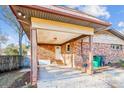 Brick carport with attached storage area at 5001 Currituck Dr, Charlotte, NC 28210