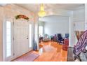 Bright and spacious entryway with hardwood floors and views into adjacent rooms at 6071 Underwood Ave, Charlotte, NC 28213