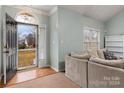 Bright and airy entryway with hardwood floors and view of front yard at 2429 Prince Dr, Lancaster, SC 29720