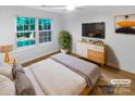 Virtually staged bedroom with large windows and ample closet space at 5003 Sharon Rd # S, Charlotte, NC 28210