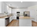 Spacious kitchen featuring granite countertops and stainless steel appliances at 1805 Lexington Ave, Monroe, NC 28112