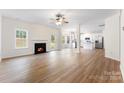 Open living room with a fireplace and kitchen views at 1805 Lexington Ave, Monroe, NC 28112